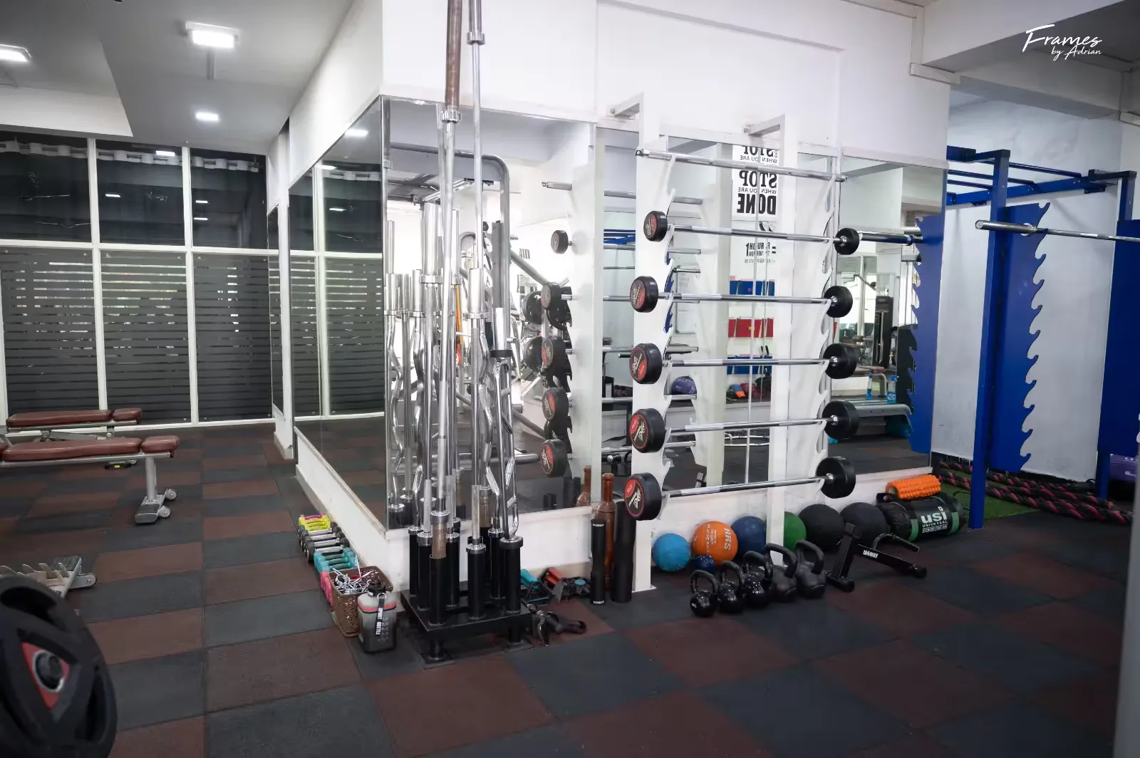 Wide free-weight and machine training area inside Power Fitness Club in Hennur.